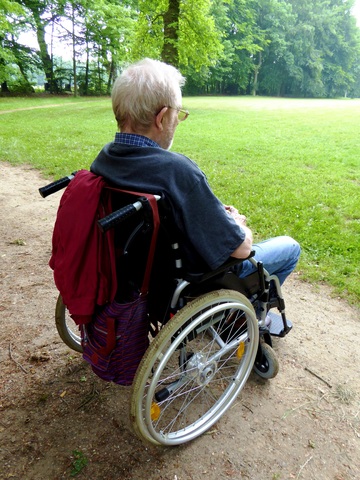 older male in a wheelchair