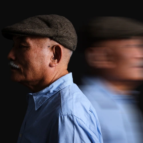 a man with dementia staring at the wall